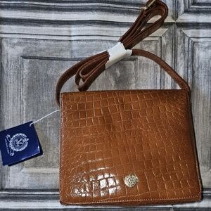 Medallion Brown leather croc purse.